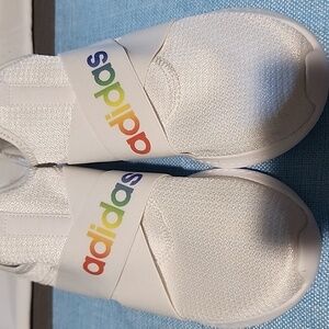 Adidas Women's White Slip-On Sneakers with Rainbow Logo